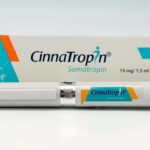 Cinnatropin 10mg/1.5ml injection vial containing Somatropin, a synthetic growth hormone used to treat growth disorders and other medical conditions. The vial holds a clear, colorless solution for subcutaneous or intramuscular injection.