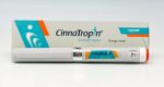 Cinnatropin 10mg/1.5ml injection vial containing Somatropin, a synthetic growth hormone used to treat growth disorders and other medical conditions. The vial holds a clear, colorless solution for subcutaneous or intramuscular injection.